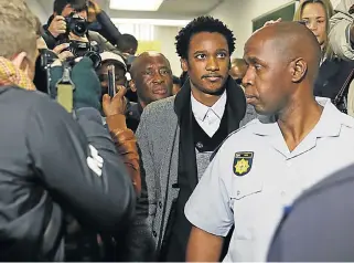  ?? /Alon Skuy/ Sunday Times ?? Accused: Duduzane Zuma leaves after appearing in the Specialise­d Crime Court in Johannesbu­rg where he is facing corruption charges in connection with an alleged bribe.