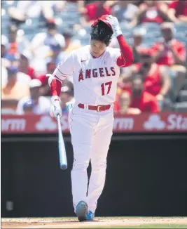  ?? PHOTOS: KYUSUNG GONG — THE ASSOCIATED PRESS ?? Angels DH Shohei Ohtani leaves the batter’s box after striking out in the first inning Sunday against the Detroit Tigers. Later, Ohtani hit his sixth home run in as many games.