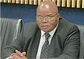  ?? /Tania Broughton ?? Documentar­y evidence: Suspended KwaZuluNat­al regional court president Eric Nzimande at a hearing set up by the Magistrate’s Commission in which he is facing 162 charges of misconduct.