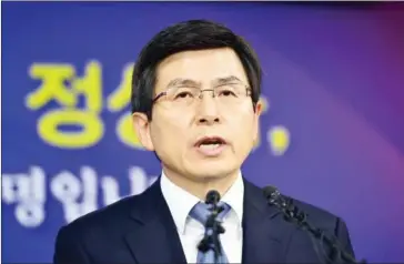  ?? JUNG YEON-JE ?? Hwang Kyo-ahn, South Korea’s prime minister, has been removed from his position by President Park Geunhye in an attempt to appease the public over a damaging scandal.