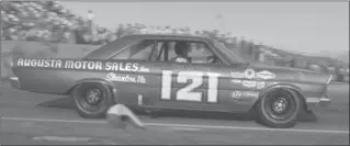  ?? SUBMITTED PHOTO ?? Dan Gurney, who died this week at the age of 86, drives one of the Wood Bros. Fords in a NASCAR race at Riverside in the mid-1960s.