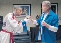  ?? BARRY WETCHER WARNER BROS. PICTURES ?? In Creed II, Michael B. Jordan, left, has good chemistry with series patriarch Sylvester Stallone, writes Peter Howell.