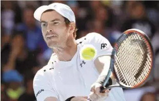  ?? AP ?? Andy Murray, quien ha emergido como favorito, quien manejó los problemas de una lesión de tobillo y avanzó a los octavos de final por noveno año al hilo al eliminar en tres sets a Sam Querrey.