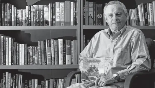  ?? ERIC WYNNE • THE CHRONICLE HERALD ?? Author John Boileau in his study at his home.