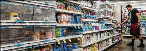  ?? ARIANA DREHSLER/ NEW YORK TIMES ?? Baby formula shelves sit nearly empty May 10 at a store in San Diego. Two children in Tennessee were recently hospitaliz­ed because their families could not find the specific formula they need during a nationwide shortage that has grown more acute.