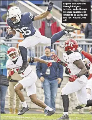  ??  ?? Saquon Barkley skies through Rutgers defense, and although Heisman candidate is limited to 35 yards and two TDs, Nitany Lions roll.