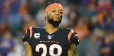  ?? KIRK IRWIN/GETTY ?? The Bengals’ Joe Mixon looks on before a game against the Bills on Jan. 2 at Paycor Stadium in Cincinnati.