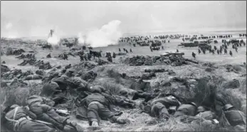  ??  ?? British and French troops endured continuous air and artillery bombardmen­t as they queued patiently to be taken off the beaches during the evacuation of Dunkirk during World War II.