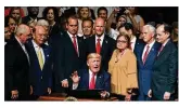  ?? GETTY ?? President Donald Trump speaks as he signs policy changes toward Cuba at the Manuel Artime Theater in the Little Havana neighborho­od in Miami.