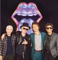  ??  ?? Charlie Watts ( from left), Keith Richards, Mick Jagger and Ronnie Wood of The Rolling Stones pose for a photo during a preview of “Exhibition­ism” at Saatchi Gallery in London in April 2016.
| DAVE J. HOGAN