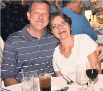  ??  ?? Sandals Negril guests Jill (right) and Steven Bell share a happy moment during the Sandals Select Dinner honouring loyal guests.