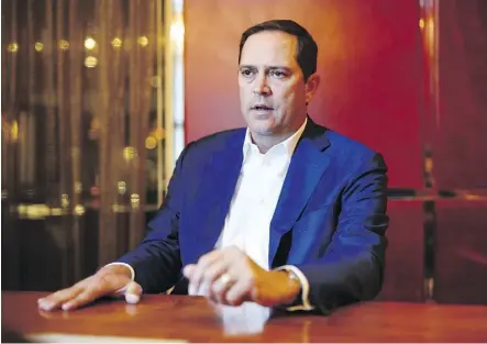  ?? COLE BURSTON ?? Cisco CEO Chuck Robbins says as companies embrace cloud-based services and internet-connected devices, cybersecur­ity will require watching the flows of data while managing the whole network.