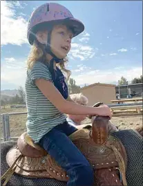  ?? COURTESY OF KELLY MCBRIDE ?? Madison Bean rides a horse at Rising Star Riders.