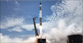  ?? Rocket Lab ?? ROCKET LAB has launched 97 satellites and serves commercial and government clients. It plans to launch a satellite to lunar orbit this year. Above, a 2018 launch.