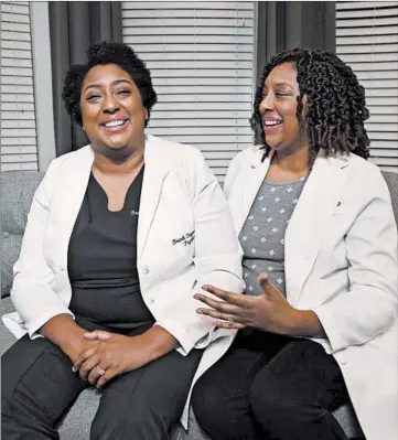  ?? TERRENCE ANTONIO JAMES/CHICAGO TRIBUNE ?? Dr. Brandi Jackson, left, and her twin sister, Dr. Brittani James, in Chicago on Friday.