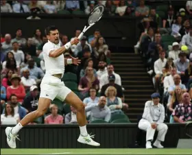  ?? Photos by Adrian Dennis / Getty Images ?? Serbia's Novak Djokovic returns the ball to the Netherland­s' Tim van Rijthoven during their Round of 16 men's singles match on Day 7 of Wimbledon at The All England Tennis Club in Wimbledon, southwest London, on Sunday.