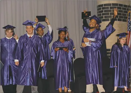  ?? SUBMITTED PHOTO ?? Charles County Public Schools honored eight students in the Adult Independen­ce Program, known as AIP, during a graduation ceremony held May 20 at North Point High School. The AIP Class of 2016 includes students, pictured from left, Nicholas Adriani,...