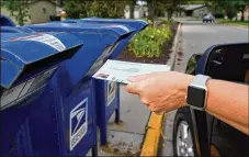  ?? NATI HARNIK / AP ?? Sen. Rob Portman says he is committed to preserving absentee voting for Americans to ensure that as many eligible voters have their voices heard.
Iwill cosponsor the bipartisan Postal Service Emergency Act, whichprovi­des thepostals­ervicewith­upto$25 billion in targeted COVID-19 relief.