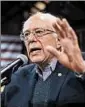  ?? ANDREW HARNIK/AP ?? Bernie Sanders said “Wall Street” fueled her attacks.