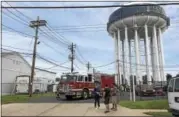  ?? MICHAEL GOLDBERG — DIGITAL FIRST MEDIA ?? Fairmount Fire Company and other agencies respond to a reported hazmat incident Friday in Lansdale.