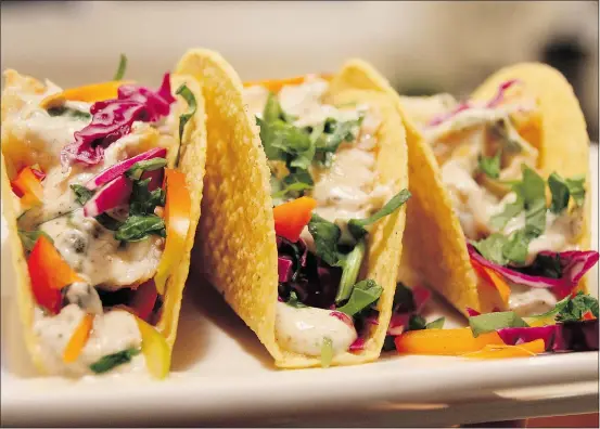  ??  ?? Fish tacos with a creamy caper sauce can be easily prepared.