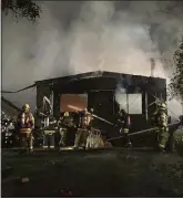  ?? Courtesy photos
/Tuolumne County Fire ?? Four residents of a home escaped uninjured and were displaced when fire destroyed the structure on Peppermint Circle off Rawhide Road north of Jamestown,tuolumne County Fire Department staff said in a social media post early Sunday.