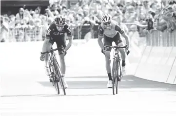  ?? - AFP photo ?? Italy’s rider of team Bahrain - Merida Vincenzo Nibali (R) sprints to cross the finish line ahead Spain’s Mikel Landa of team Sky during the 16th stage of the 100th Giro d’Italia,Tour of Italy, cycling race from Rovetta to Bormio.