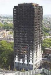  ??  ?? The cladding that encased the tower was inflammabl­e and led to the building igniting like a torch within 15 minutes.