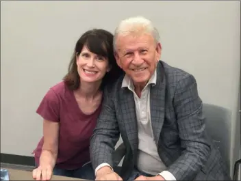  ?? PEG DEGRASSA - MEDIANEWS GROUP ?? Amy Schaffer Maguire of Norwood poses for a photo with singer Bobby Rydell at Ridley Township Public Library and Resource Center Thursday night.