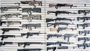  ?? ELAINE THOMPSON THE ASSOCIATED PRESS FILE PHOTO ?? In addition to institutin­g the ban, the federal government also plans to empower provinces and cities to take steps to manage the storage and use of handguns within their jurisdicti­ons.