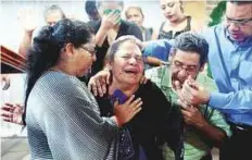  ?? Reuters ?? Yadira Cordoba, the mother of slain teen Orlando, cries during his funeral service.