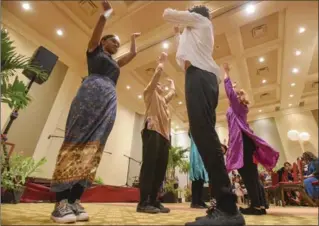  ?? GARY YOKOYAMA, THE HAMILTON SPECTATOR ?? Dancers from the Nancy Campbell Academy in Stratford perform at the Baha’i anniversar­y celebratio­n on Sunday.