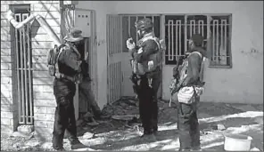  ?? AP ?? Iraqi security forces entering the southern neighborho­ods of Ramadi search house to house Wednesday for Islamic State militants.