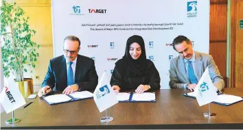  ?? Courtesy: Adnoc ?? Adnoc LNG’s Fatima Mohammad Al Nuaimi, Arthur Crossley Sanz, General Manager of Tecnicas Reunidas; and Chaouci Yassine, CEO of Target Engineerin­g sign an agreement to design, supply and build a new gas plant on Das Island.