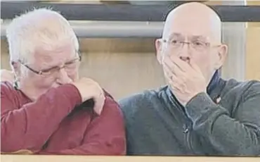  ??  ?? 0 First Minister Nicola Sturgeon makes a formal apology to gay men at the Scottish Parliament yesterday, leaving two men in the gallery visibly moved