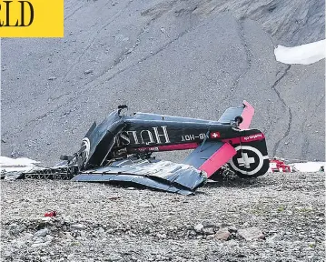  ?? POLICE CANTONALE DES GRISONS / AFP PHOTO ?? The remains of the Junkers Ju-52 aircraft that crashed on Saturday into Piz Segnas, a 3,000-metre peak in eastern Switzerlan­d. The plane, built in Germany in 1939 and now a collector’s item, belongs to Swiss firm Ju-Air.