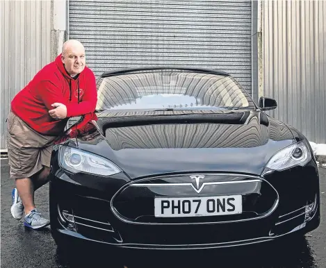  ??  ?? ONE of the first Tesla electric cars driven in the UK has been donated to Glasgow Museums.
Chris Clarkson handed the car over to curators after he was inspired by visits to the city’s transport museum as a youngster.
The cutting-edge car, which was...