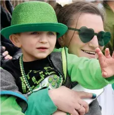  ?? ?? HEART EYES: Korey Graney of Quincy and her son Ryan, 4, watch the parade.