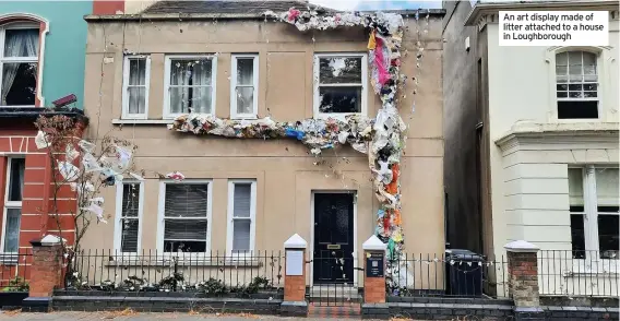  ??  ?? An art display made of litter attached to a house in Loughborou­gh