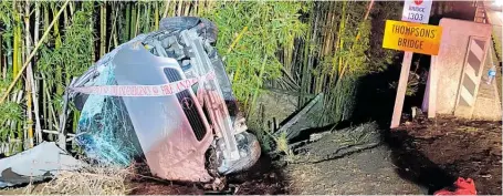  ?? Photo / Supplied ?? Five people were in this car when it rolled and just missed a bridge abutment on SH1 south of Kaitaia. One woman was trapped inside the wreckage while a man, who later died, was thrown from the vehicle.