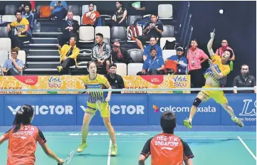  ??  ?? Malaysia’s Goh Soon Huat and Shevon Jemie Lai came from behind to qualify for the semi-finals.