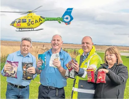  ?? Picture: Kenny Smith. ?? Angus Forbes, school janitor Willie Ness, SCAA deputy CEO and fundraisin­g and communicat­ions director Nick Harvey, and Mandy Bennett, Arnold Clark Rental Ops.