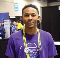  ?? The Sentinel-Record/Donald Cross ?? ■ RIGHT: Osceola High School student Kadan Newsome is shown inside Bank OZK Arena Tuesday at the EAST Conference. He is winner of the EASTCon23 Logo Competitio­n.