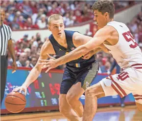  ?? TREVOR RUSZKOWSKI/USA TODAY ?? Joey Hauser, who plays center when MU goes with a smaller lineup, was one of the bright spots Wednesday night