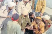  ?? HT PHOTO ?? Police nabbing the accused at Kapial village in Sangrur.