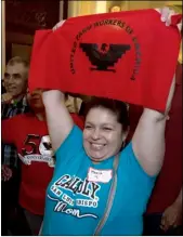  ?? AP PHOTO ?? In this Aug. 29, 2016, file photo Maria Ceja joined other farm workers in celebratin­g outside the Assembly Chambers after lawmakers approved a measure requiring farmworker­s to receive overtime pay after working eight hours, at the Capitol, in Sacramento.