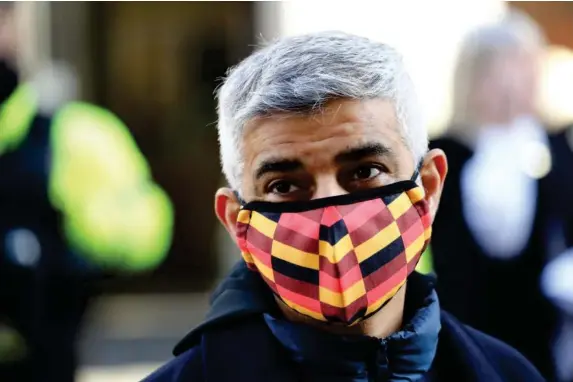  ?? (Reuters) ?? The London mayor warns fear of disease may keep elderly and ethnic minorities from polling stations