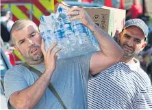  ??  ?? Community heroes... Food and water delivered yesterday