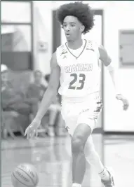  ?? Courtesy Photo/Lyndel Moodey ?? Raheem Ashford heads down court during the Coahoma-McCamey varsity basketball game on Friday, Dec. 3, 2021. Ashford had a team high of 12 points for the game.