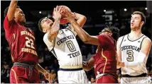  ?? CURTIS COMPTON / CCOMPTON@AJC.COM ?? Tech sophomore guard Michael Devoe (center) has scored 20-plus points five times this season.